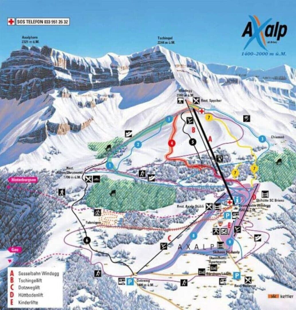 A ski resort map with marked ski runs, lifts, and facilities.