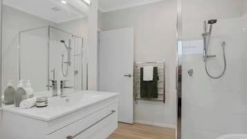 Bathtub, hair dryer, towels