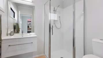Bathtub, hair dryer, towels