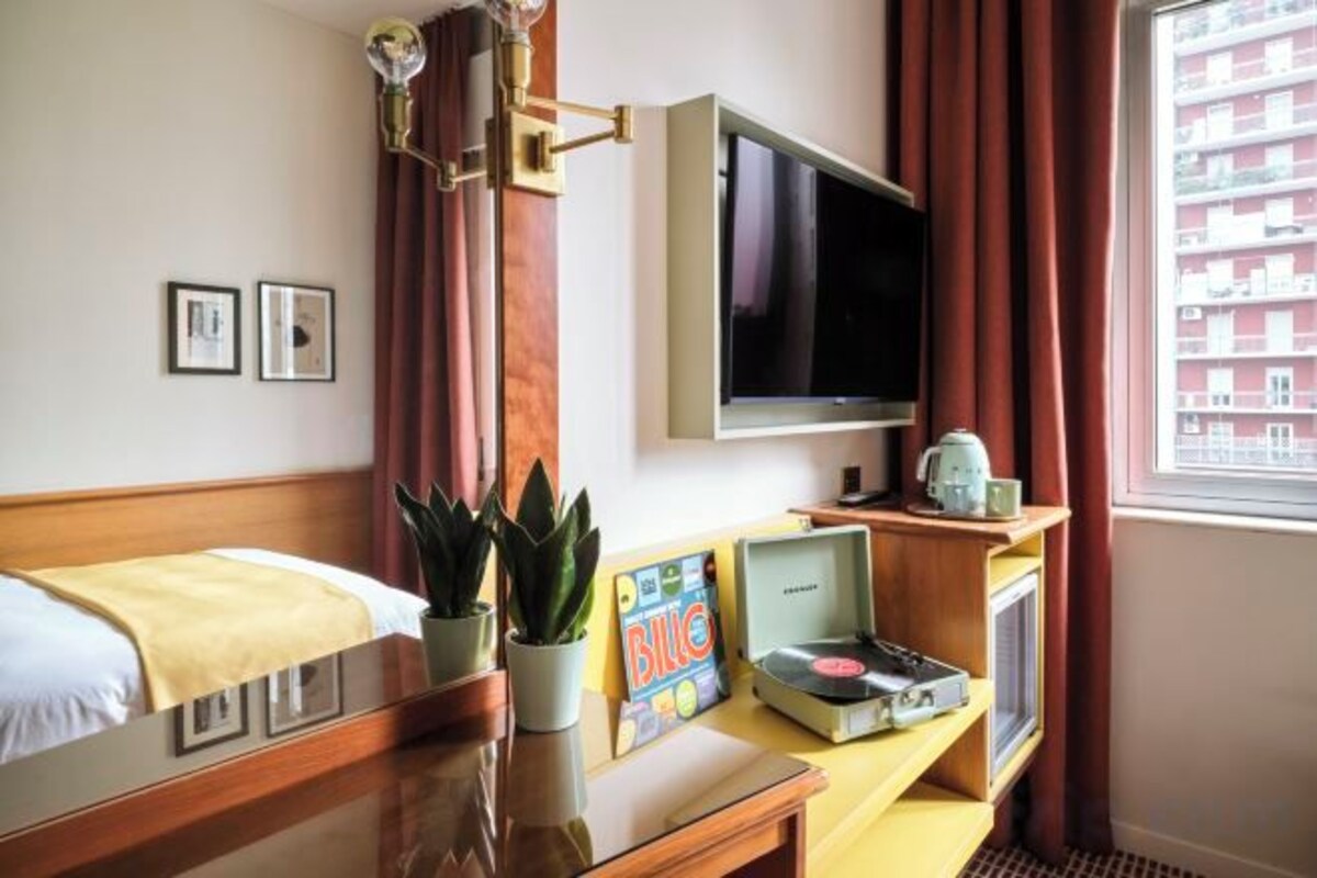 Premium bedding, down comforters, in-room safe, desk