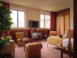 Premium bedding, down duvets, in-room safe, desk