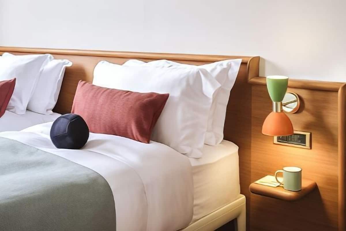 Premium bedding, down comforters, in-room safe, desk