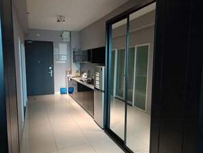 Fridge, microwave, stovetop, coffee/tea maker