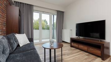 Apartment, 1 Bedroom, Balcony | 1 bedroom, desk, bed sheets