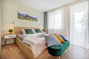 1 habitación, tabla de planchar con plancha, cuna de viaje y internet 