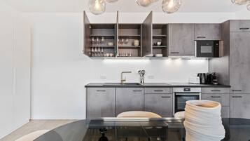 Apartment | Private kitchen | Fridge, microwave, oven, stovetop