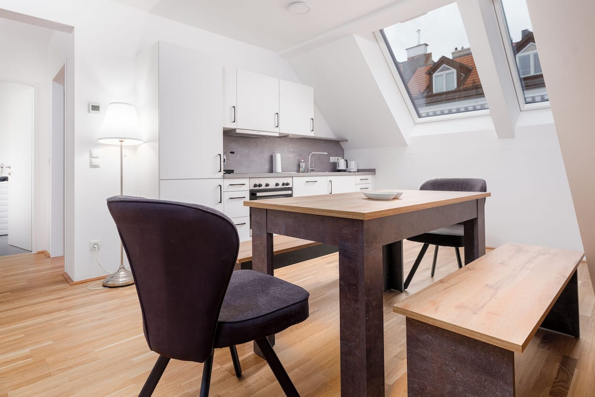 Deluxe Apartment | Living area | 42-inch Smart TV with satellite channels, Netflix, streaming services