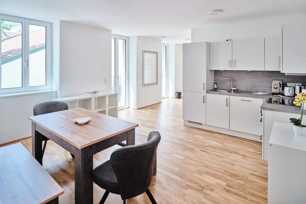 Comfort Apartment | Living area | 42-inch Smart TV with satellite channels, Netflix, streaming services