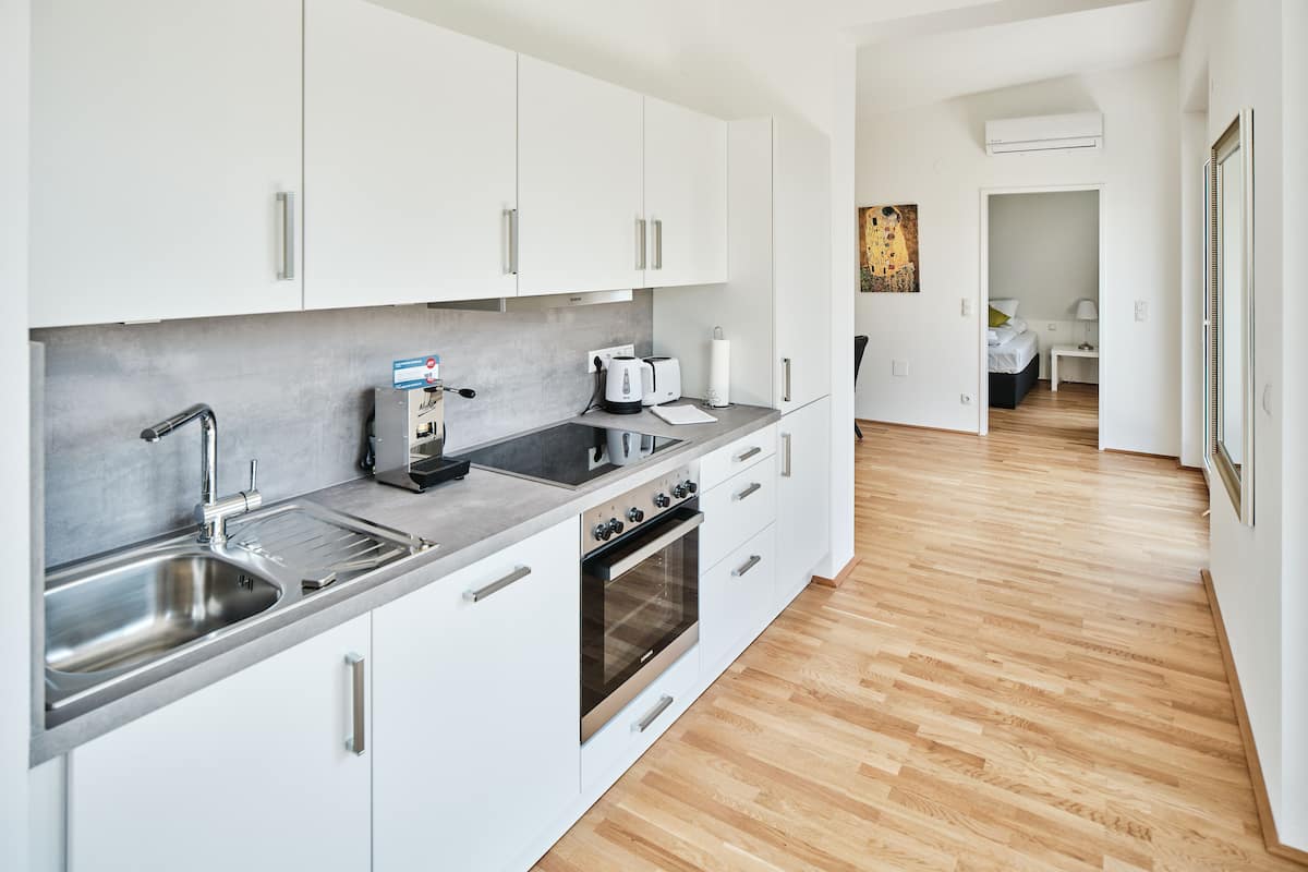 Superior Apartment | Living area | 42-inch Smart TV with satellite channels, Netflix, streaming services
