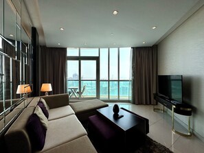Panoramic Apartment | Living area | 50-inch Smart TV with digital channels, Netflix, streaming services
