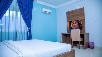 Economy Room | 1 bedroom, desk, laptop workspace, free WiFi