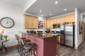 Microwave, stovetop, dishwasher, coffee/tea maker