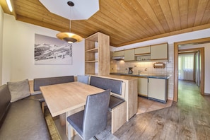 Classic Apartment | Living area | 40-inch TV with cable channels