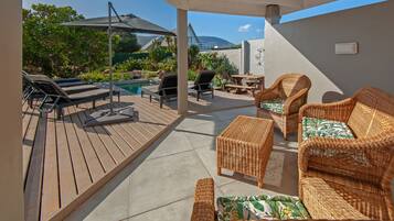 Outdoor pool, pool umbrellas, sun loungers