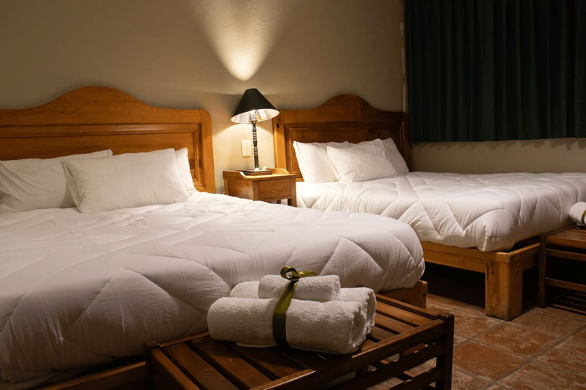 Standard Room, 2 Queen Beds, Ensuite | Desk, laptop workspace, WiFi (free), bed sheets