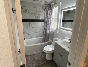 Hair dryer, towels, toilet paper