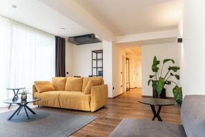 Superior suite | Woonkamer | Smart-tv
