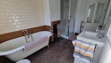 Cottage | Bathroom | Separate bathtub and shower, deep-soaking bathtub, hair dryer, towels