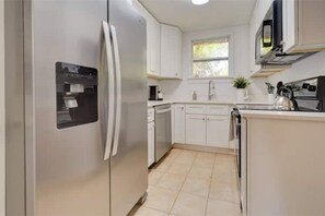 Fridge, microwave, oven, stovetop - Surfside Beach House (St. Augustine)