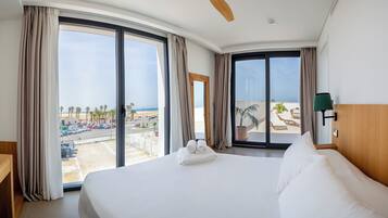 Premium Suite | Premium bedding, down comforters, memory foam beds, laptop workspace