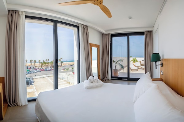 Premium Suite | Premium bedding, down duvets, memory-foam beds, laptop workspace