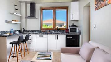 Mini-fridge, microwave, stovetop, dishwasher