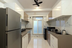 Fridge, microwave, stovetop, electric kettle