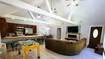 Smart TV, fireplace, foosball