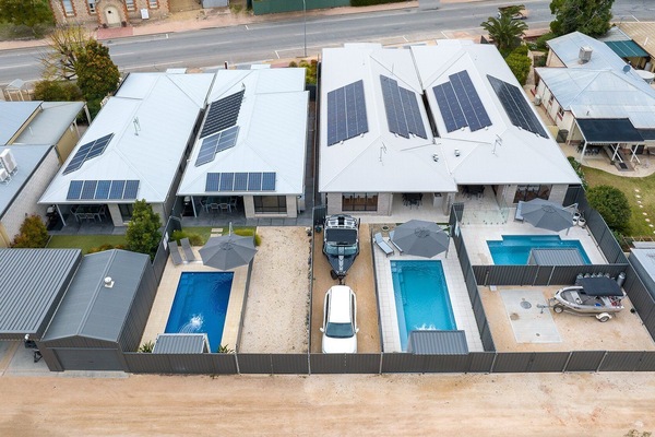 Rear of 48, 50, 52 and 54 Villas showing rear laneway access for second car and/or boat