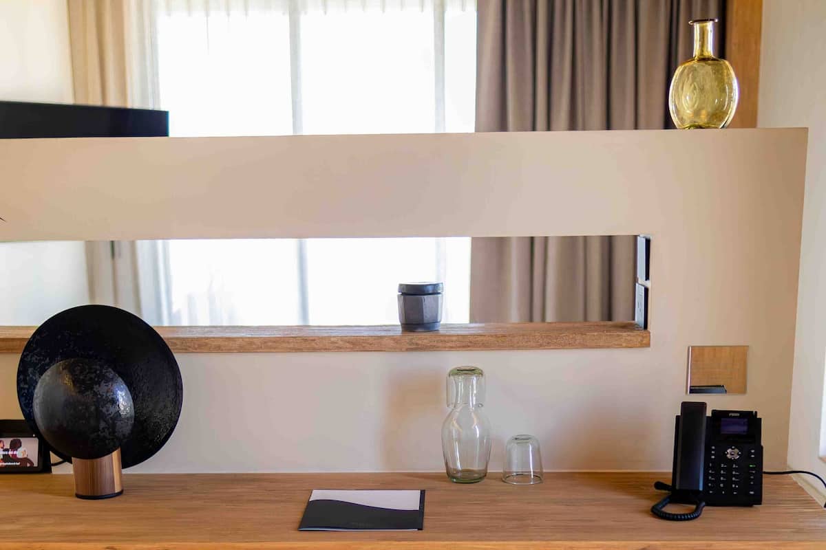 Premium bedding, down duvets, minibar, in-room safe