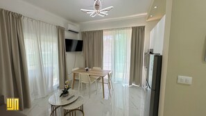 Departamento de lujo | Área de sala de estar | Televisión de pantalla plana