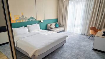 Hypo-allergenic bedding, in-room safe, desk, laptop workspace