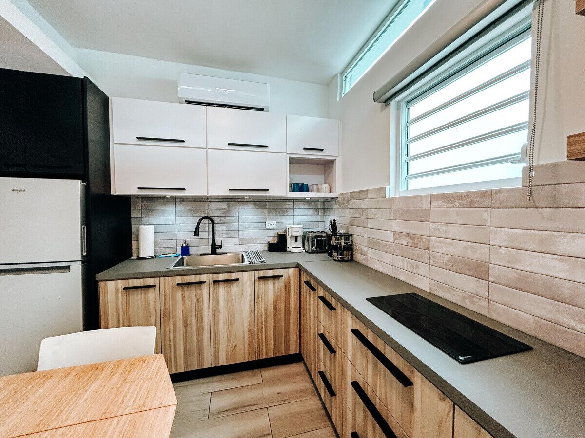 Fridge, microwave, stovetop, coffee/tea maker