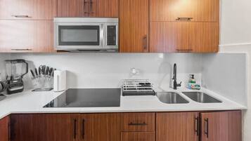 Fridge, microwave, stovetop, coffee/tea maker