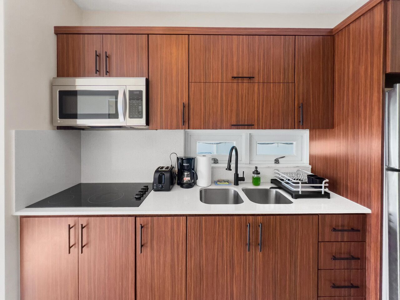 Fridge, microwave, stovetop, coffee/tea maker