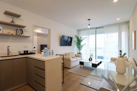 Apartment | Living area | 40-inch Smart TV with cable channels