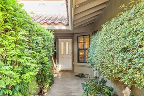 Home entrance with private courtyard. 