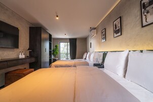 Premium bedding, down comforters, in-room safe, desk