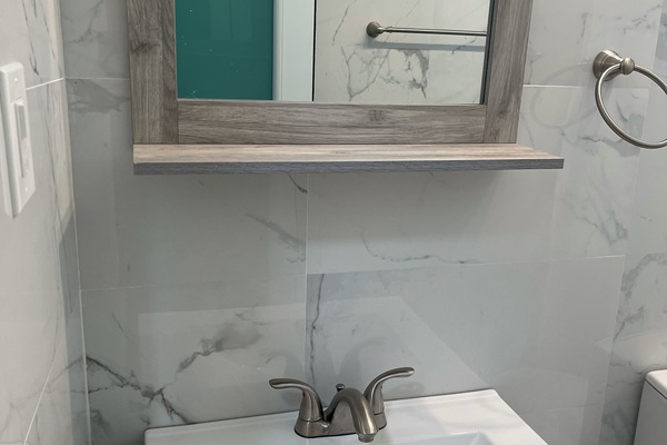 Full bathroom in the lower level of the home.