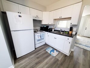 Fridge, microwave, oven, stovetop - Renovated Beach Theme Apt Near OWA and Beach 702 (Foley)