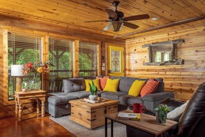 Smart TV, fireplace, books - Modern Hochatown Cabin: 2 King Suites w/ Private Baths, Hot Tub & Arcade (Broken Bow)