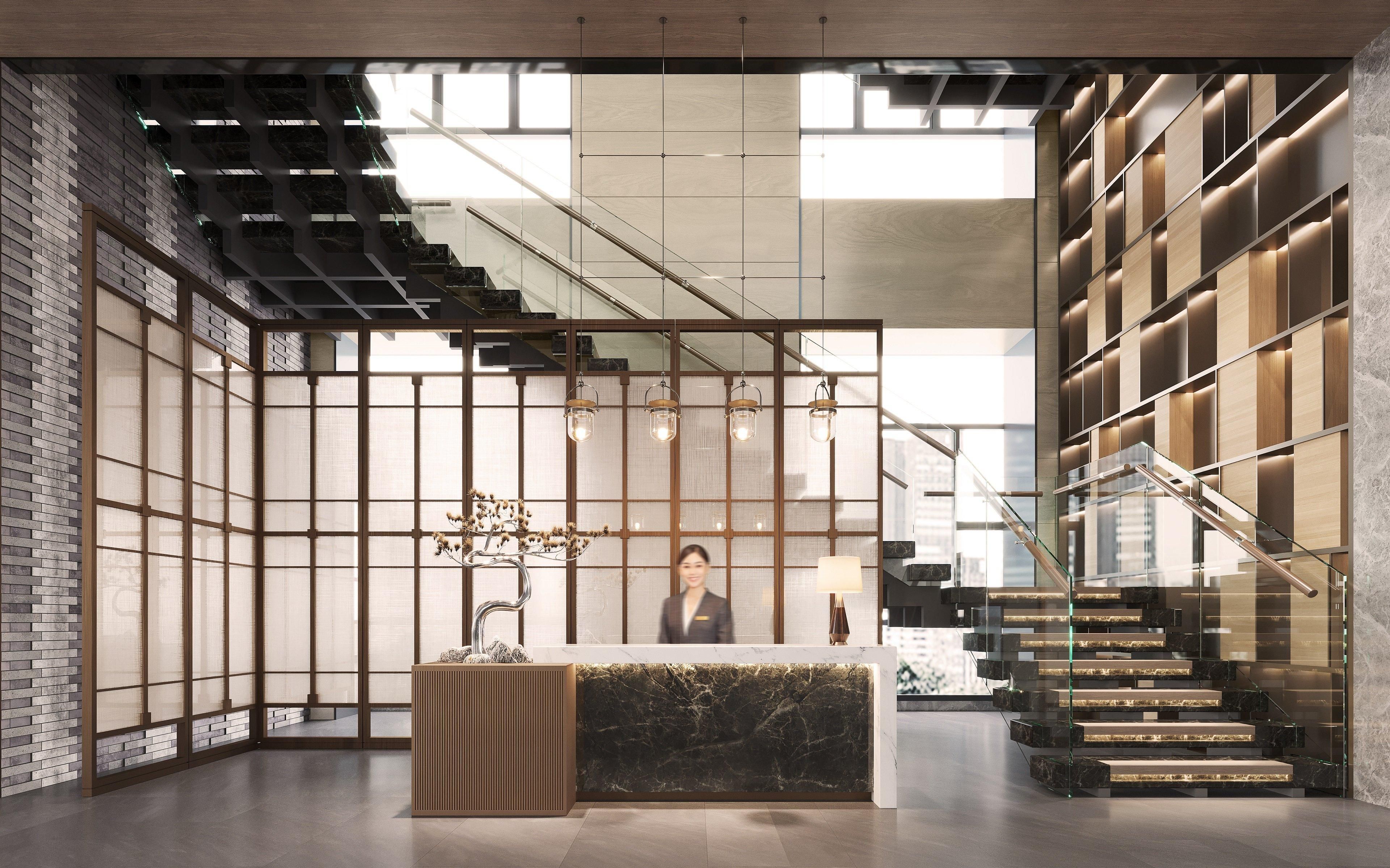 A modern reception area with a marble counter, a staircase, and a view of the city.