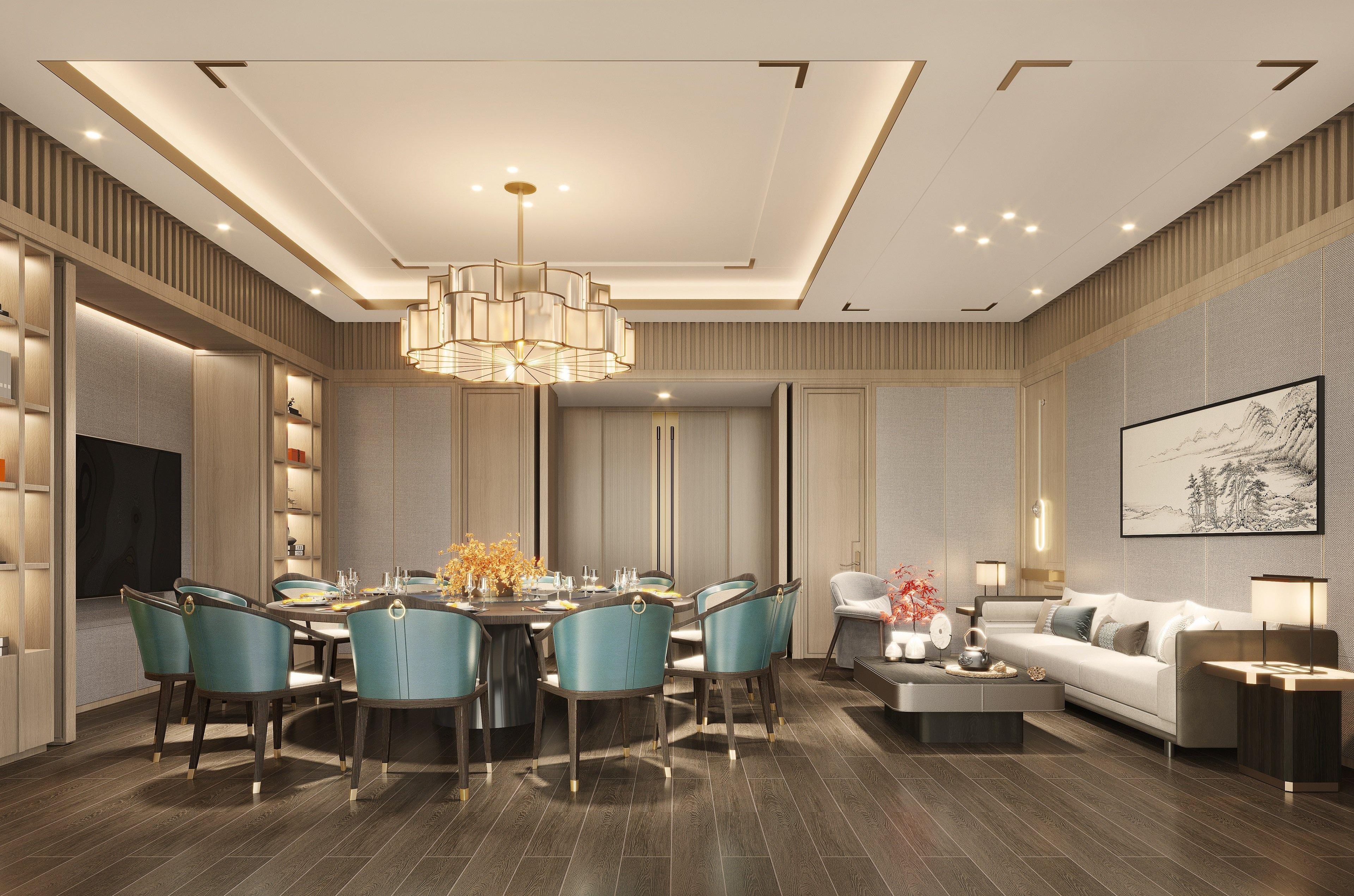 A modern dining area with a round table, teal chairs, and a chandelier.