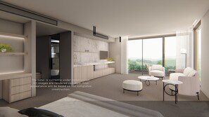 A modern hotel room with a large window, a kitchen area, and a seating area with a view. - Re'em Yarra Valley (Melbourne)