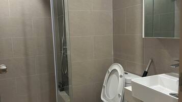Hair dryer, bidet, towels, soap