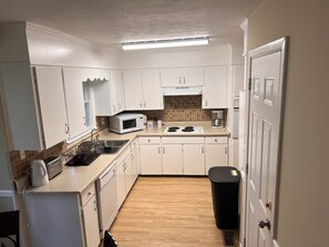 Fridge, microwave, oven, stovetop - House of Prayer, 3-bedroom house with a picnic backyard. (Anniston)