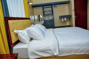 Executive Suite, Ensuite, Garden View | Tempur-Pedic beds, bed sheets - Harleys Executive Suites (Eldoret)