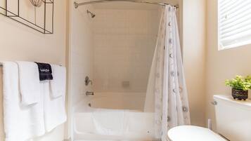 Hair dryer, towels, soap, shampoo