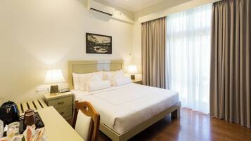 Deluxe Double Room | In-room safe, desk, laptop workspace, blackout drapes