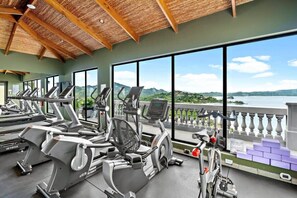Fitness facility - Luxury Condo with Panoramic Ocean Views, Sparkling Infinity Pool, and Modern Open-Concept Design (Playa Flamingo)